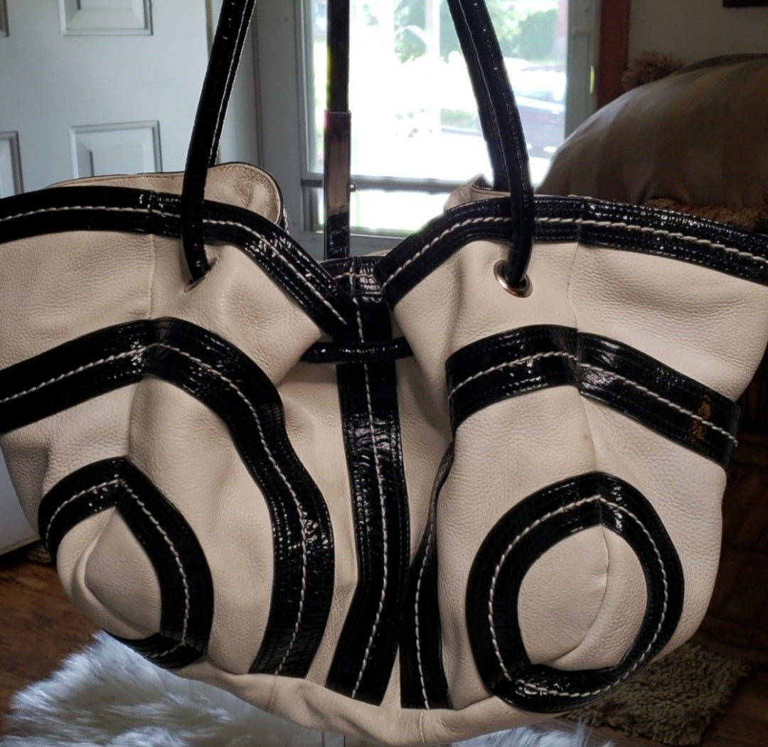 Kate Laundry black and white leather bucket bag.