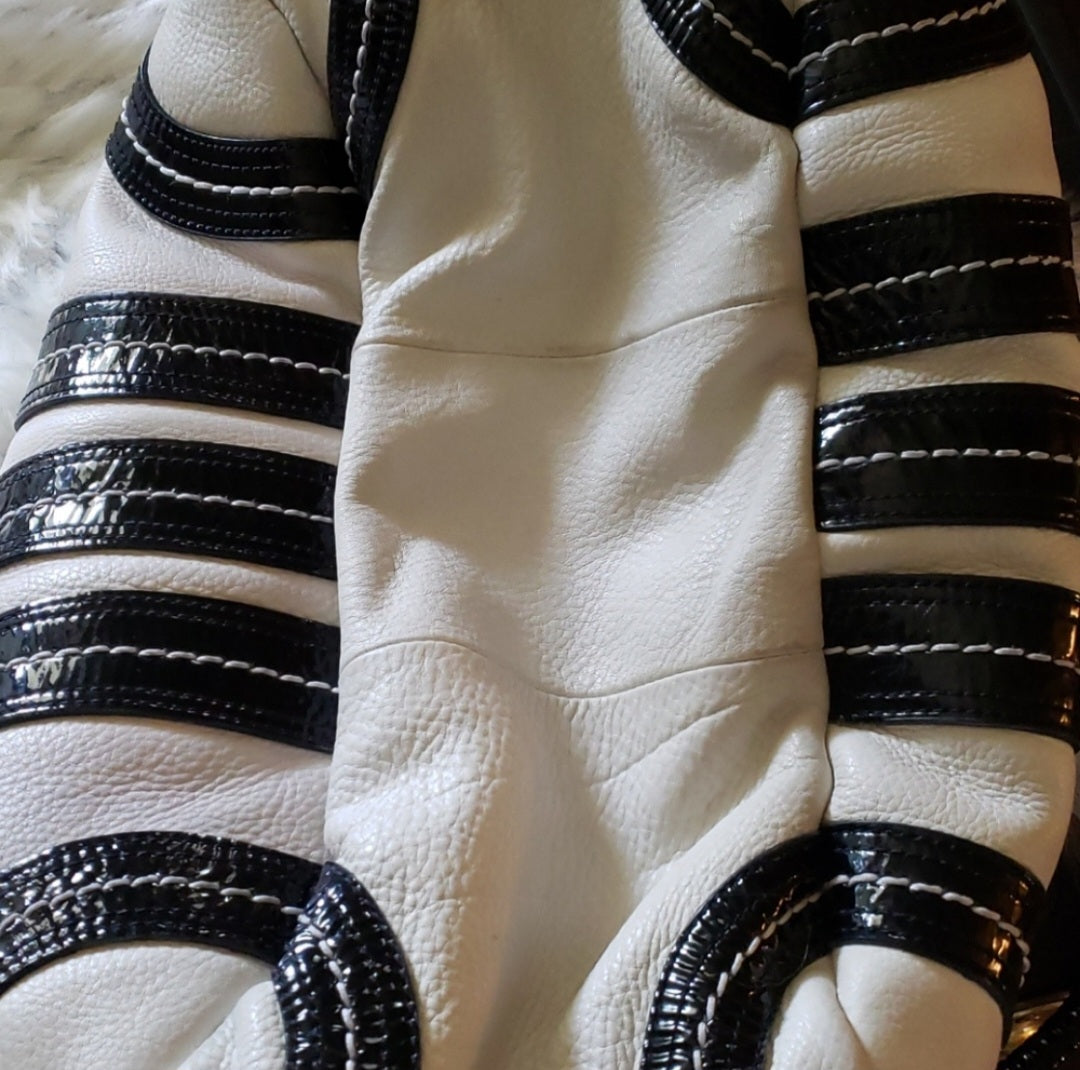 Kate Laundry black and white leather bucket bag.