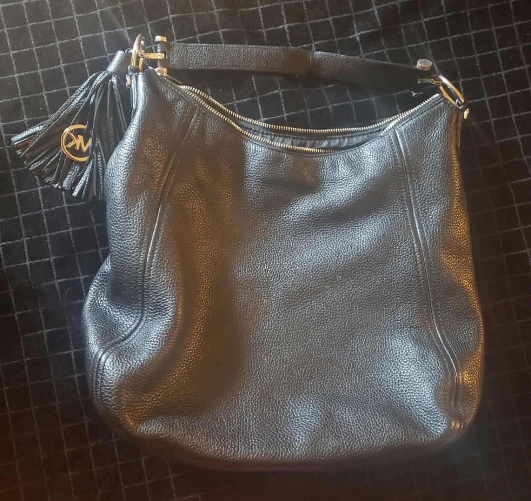 Michael Kors xlarge blk leather handbag.
