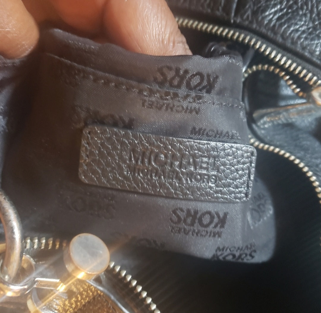 Michael Kors xlarge blk leather handbag.