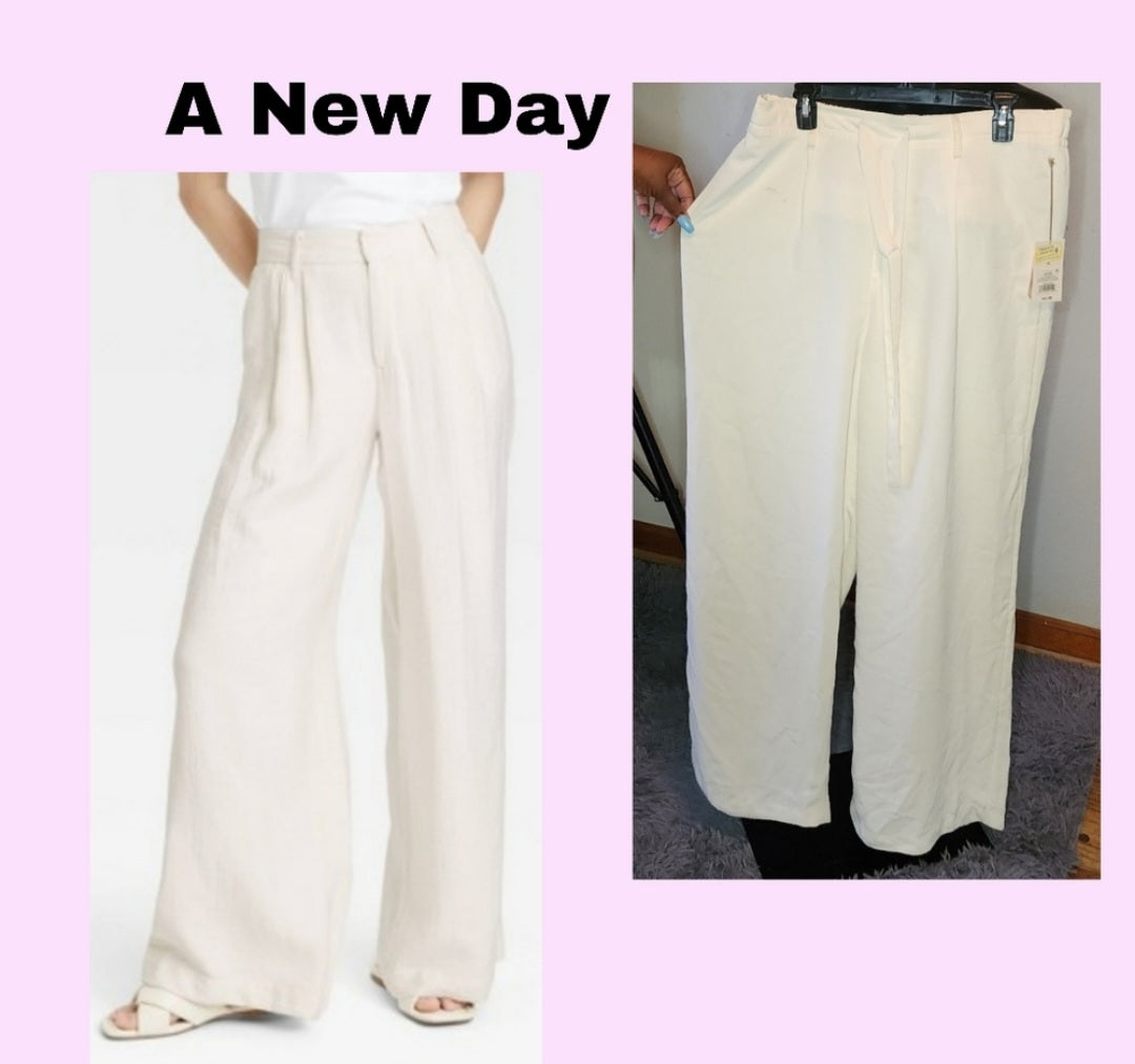 A New Day wide-leg cream colored palazzo's. Sz XL. Fits plus sz 14 or 16.