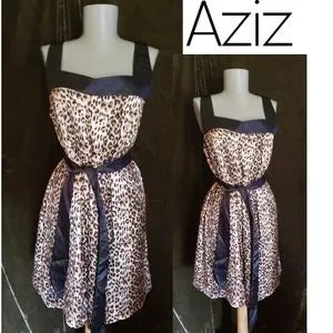 Aziz animal print (leapord) satiny dress. Med&Lrg