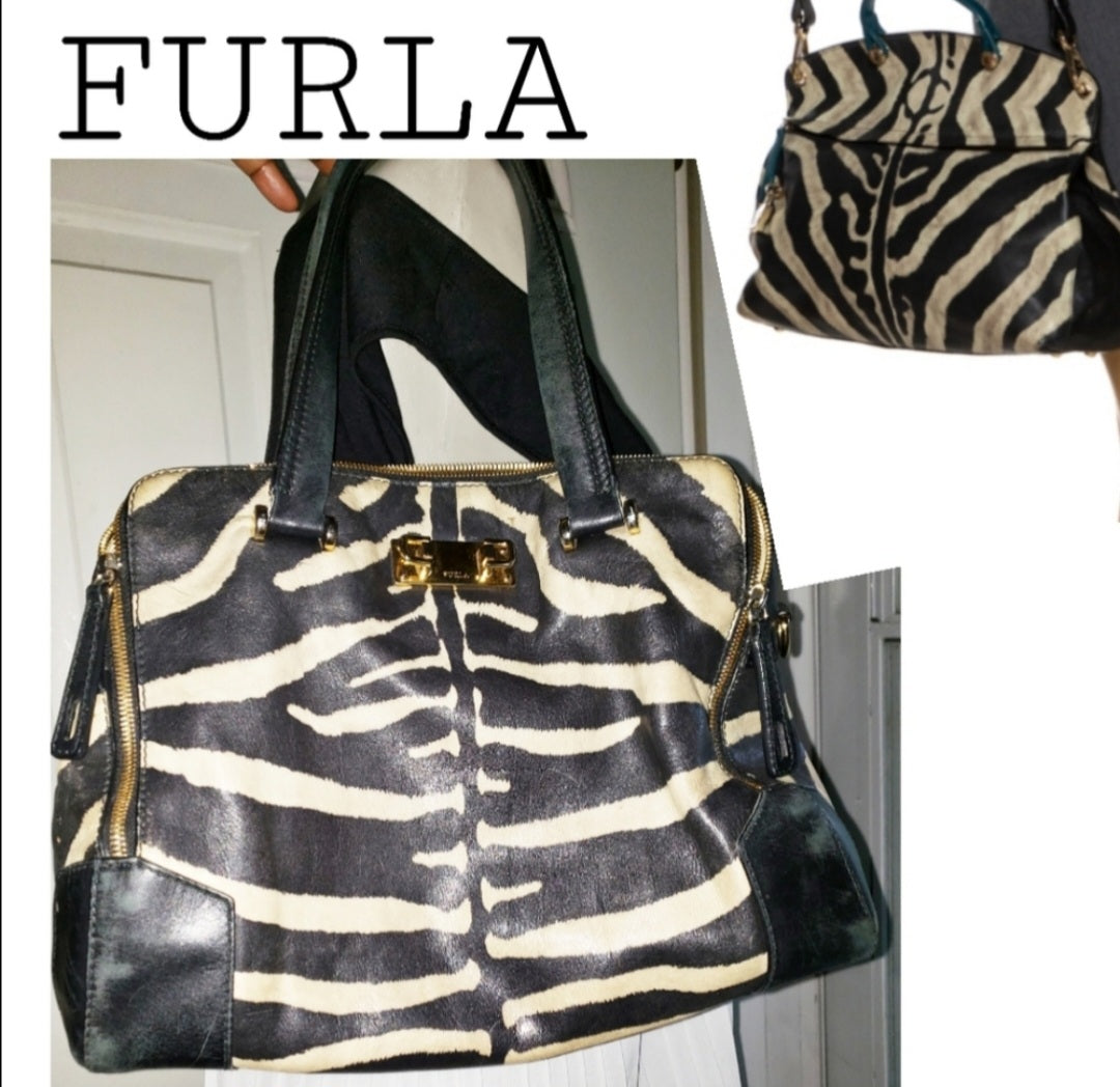 Auth FURLA zebra print piper dome leather handbag.