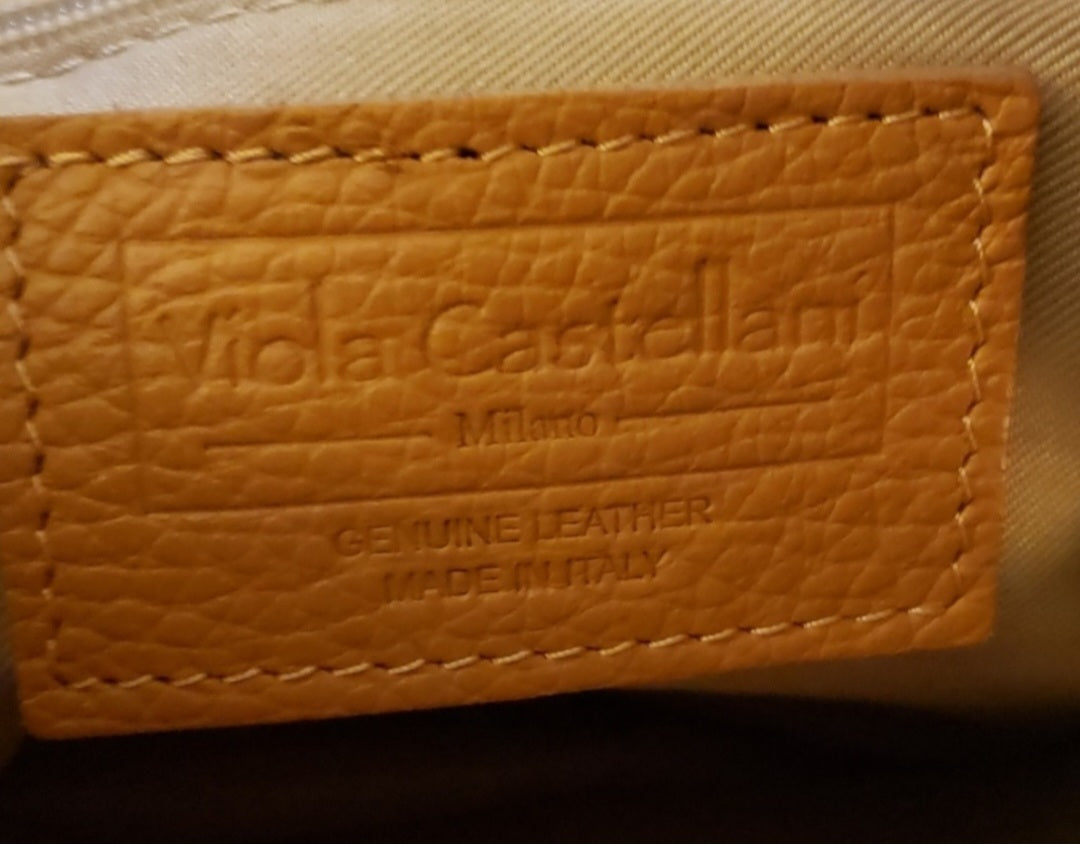 Auth Viola Castellani (Milano) saddle tan bag.