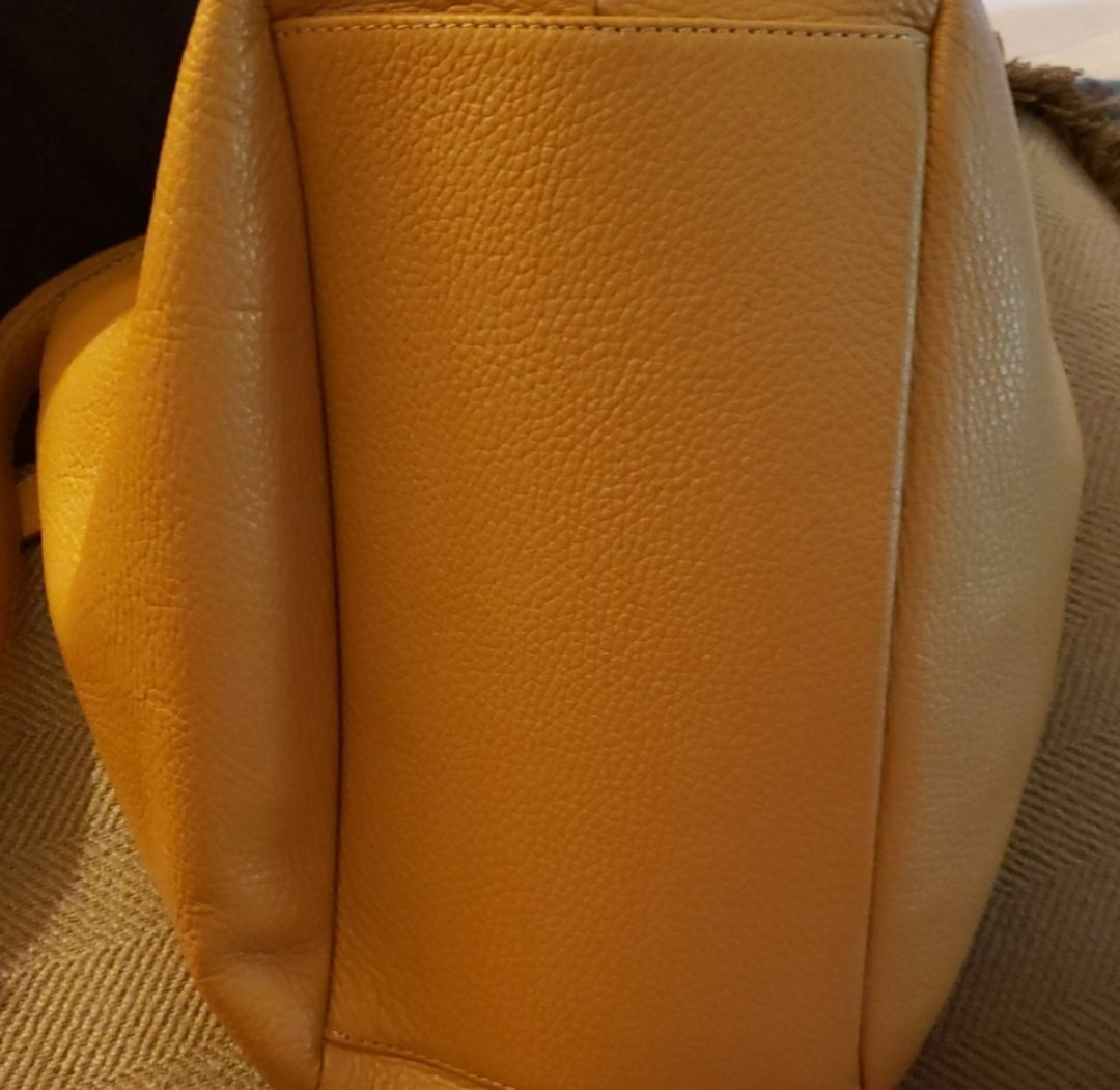 Auth Viola Castellani (Milano) saddle tan bag.