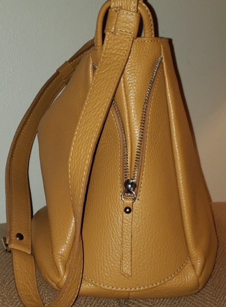 Auth Viola Castellani (Milano) saddle tan bag.