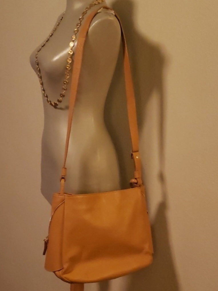 Auth Viola Castellani (Milano) saddle tan bag.