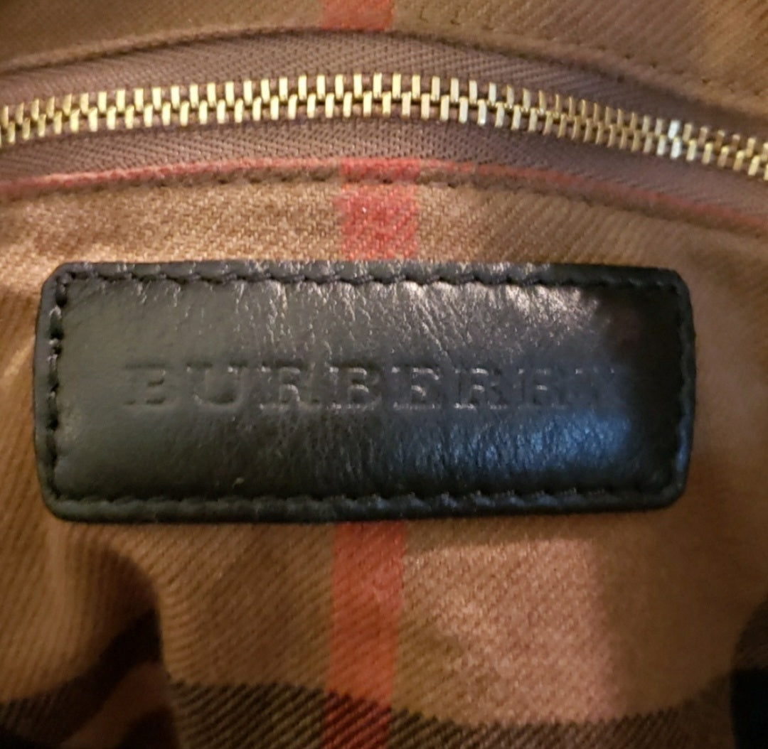 Auth Burberry black leather handbag w/traditional check