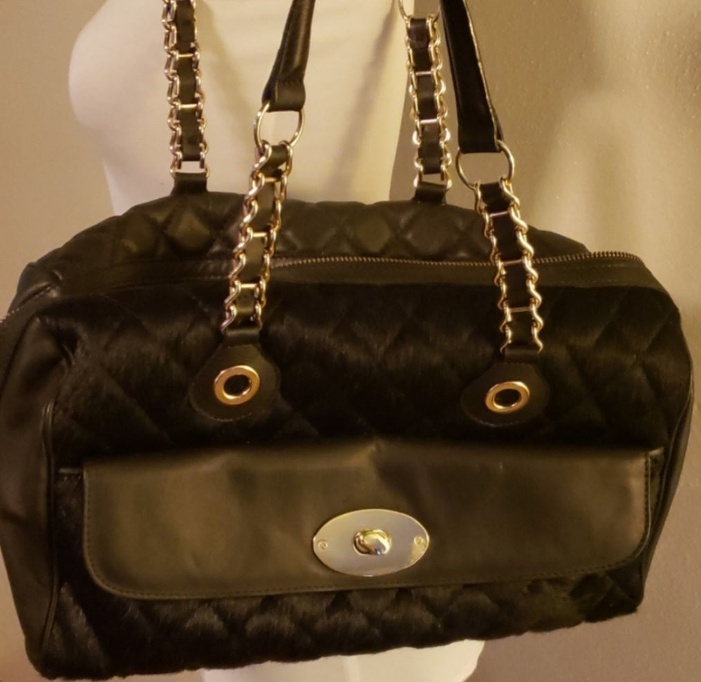 Claudia Firenze black lthr quilted handbag.