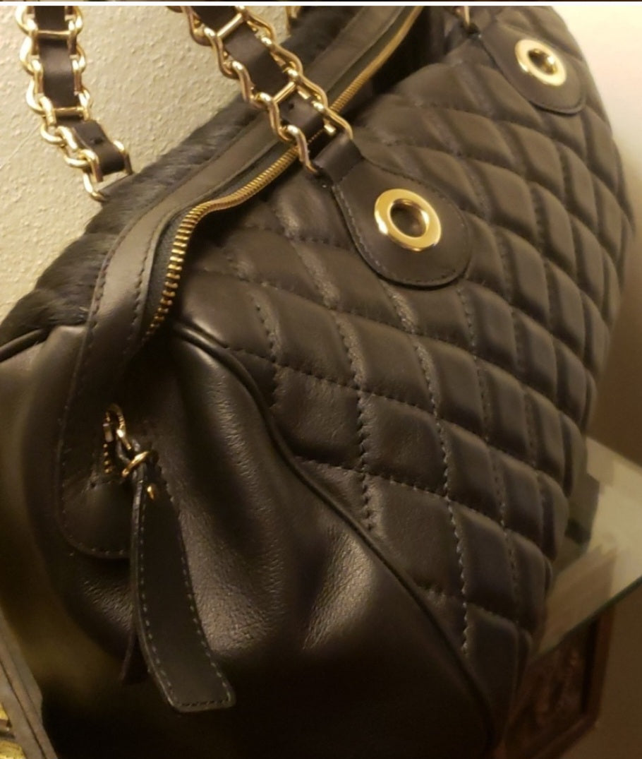 Claudia Firenze black lthr quilted handbag.