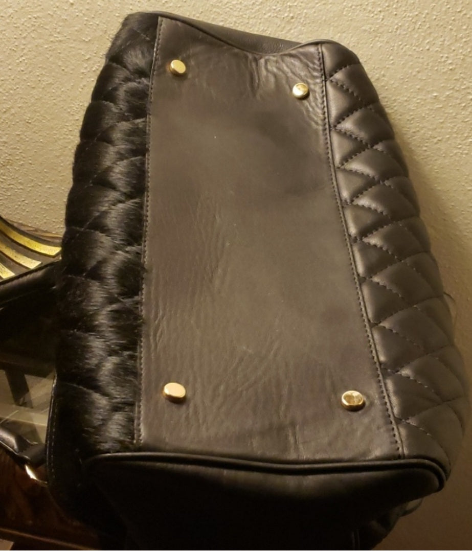 Claudia Firenze black lthr quilted handbag.