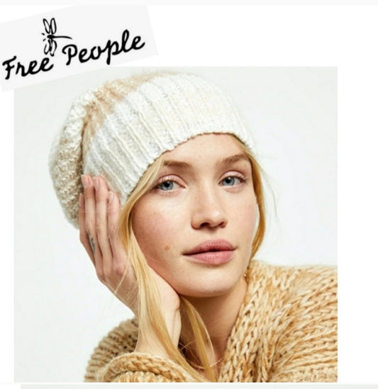 Free People "Sugar" striped cable knit hat.