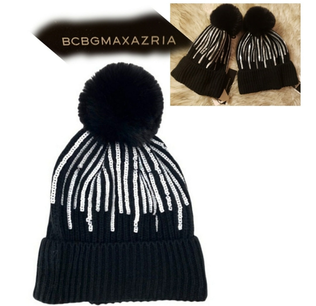 Bcbgmaxazria began faux fur black/silver sequin winter hat w/puffball.