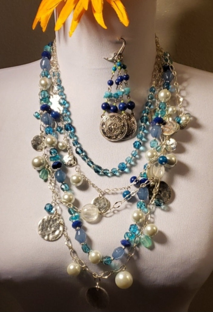 White House Black Market silver/blue/turquiose beaded set.