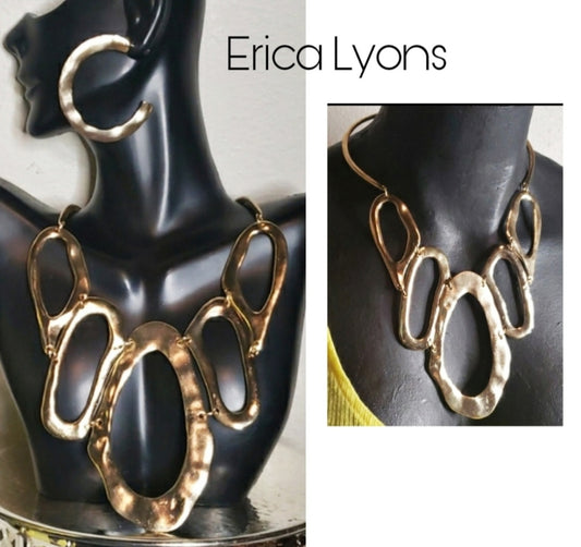 Erica Lyons gold hanmered metal art necklace set.