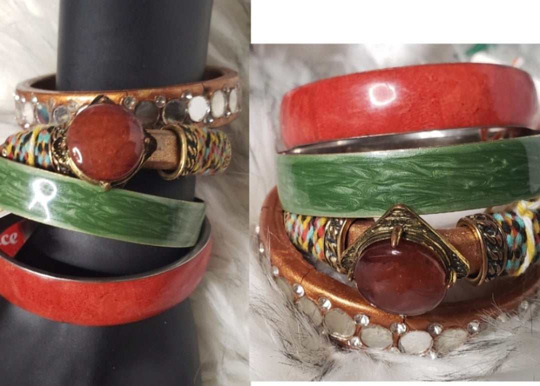 4 Set of stone and inlaid bracelets.