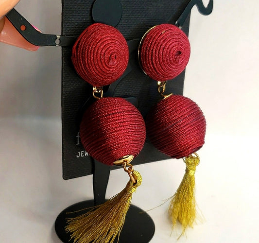 Free Press ball/tassle earrings.