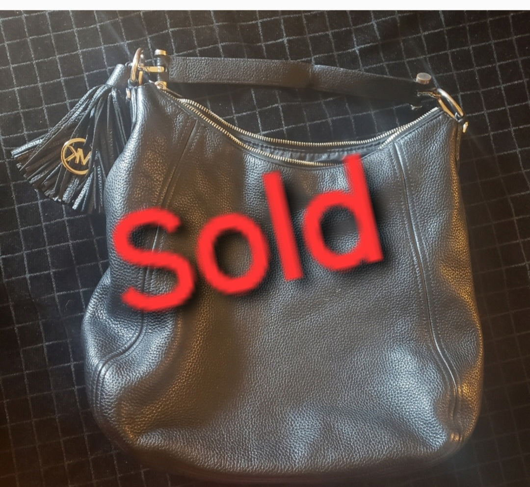 Michael Kors xlarge blk leather handbag.