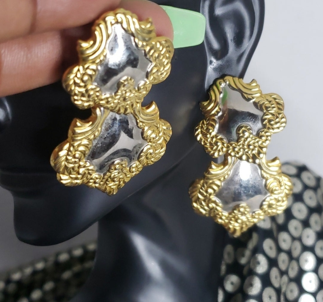 Erica Lyons silver/gold double drop earrings.