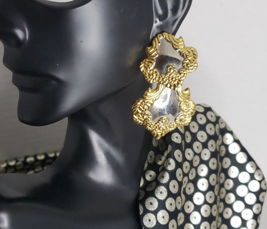 Erica Lyons silver/gold double drop earrings.