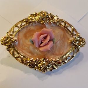 Vintage rose cameo lapel pin.