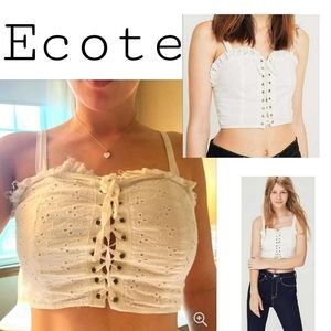 UO Ecote white grommet lace up crop top. sz LRG