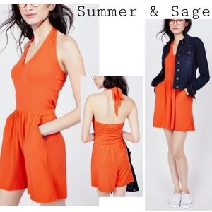 Summer & Sage

Orange Halter Tie Neck Romper
Sz Sm