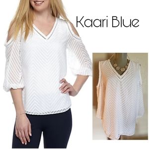 Kaari Blue cold shoulder chevron pattern top. Sz L