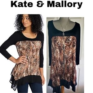 Kate & Mallory® Knit & Woven Sharkbite hem top.