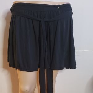 Black wrap around mini skirt.  Free size. Jersey