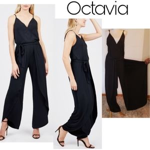 Octavia split side leg jumpsuit. Sz Lrg. New. Blk. Fits sz 12 or 14.