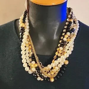 Thalia Sodi pearl/rhinestone 32" necklace.